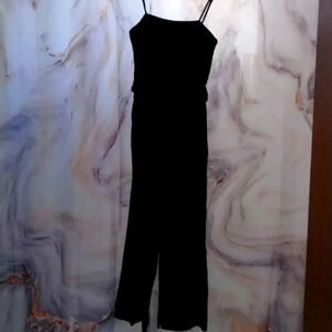 JCrew black linen spaghetti straps jumpsuit front pocket and waist belt.